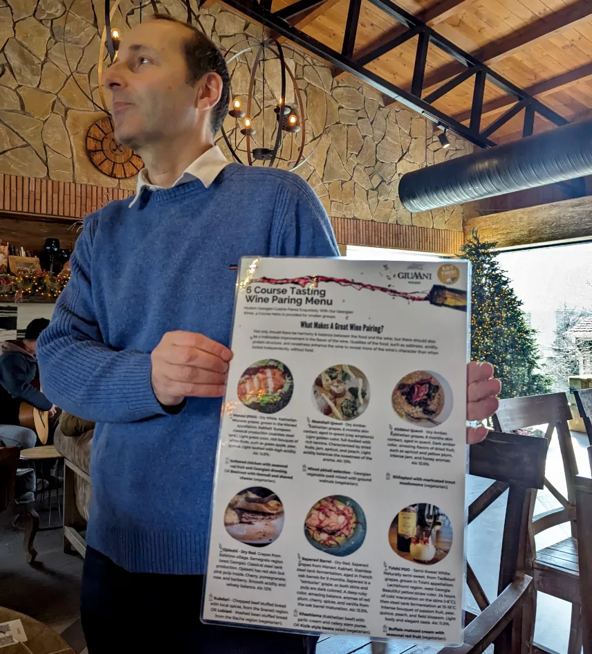 Picture of Giorgi presenting our wine pairing menu